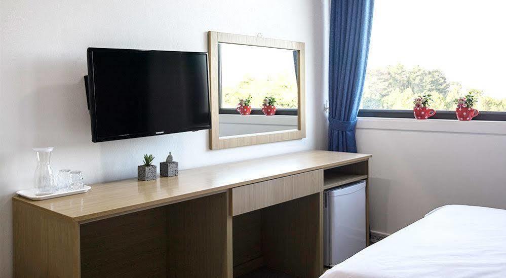 Ra Tourist Hotel Чеджу Екстериор снимка